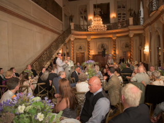 <h2>Dinner toasts in the Ballroom</h2>Photo by Kevin Allen.